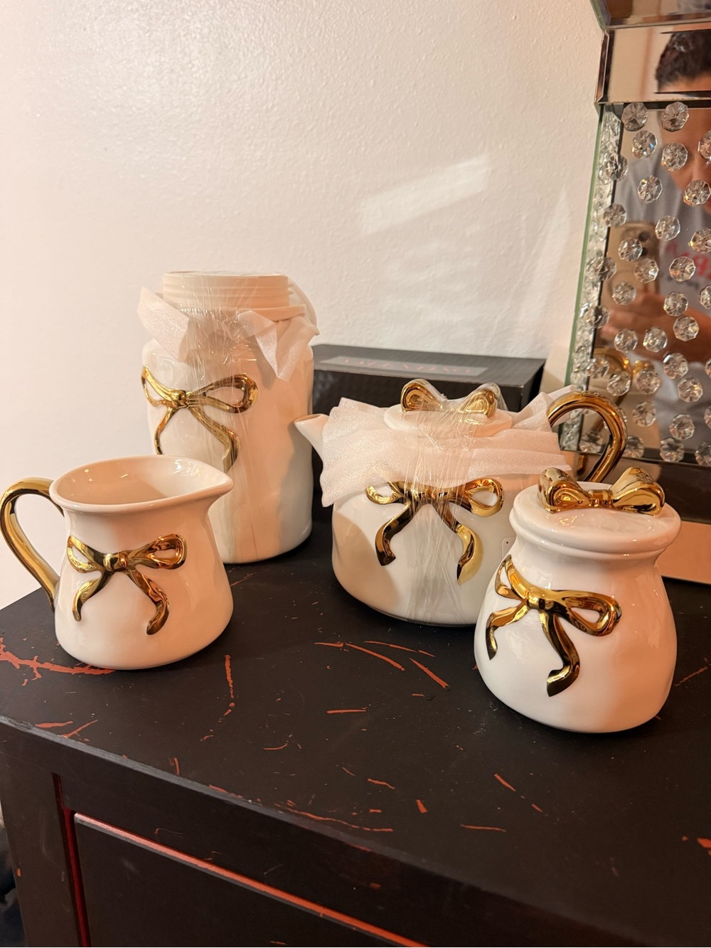 White Ceramic Bow Accent Canister Set with Gold Trim